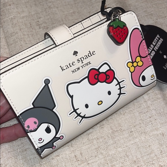 kate spade Handbags - kate spade NWT! x Hello Kitty & Friends Medium Bifold Wallet